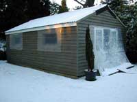 Shed under snow